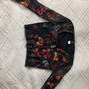 A cropped mesh Jean Paul Gaultier blouse